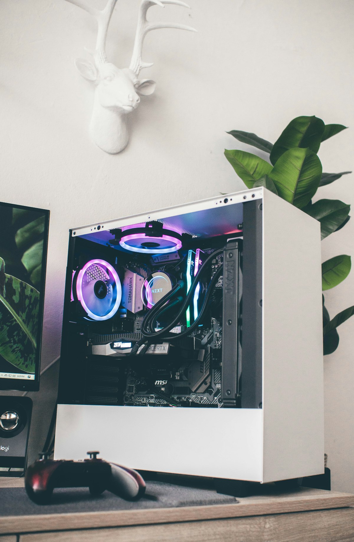 Black and purple gaming PC tower on a desk